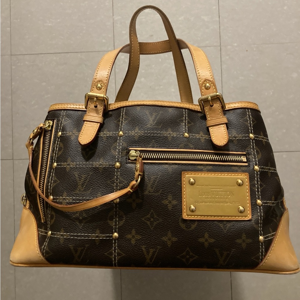 Louis Vuitton authentic Rivet handbag Limited Edition